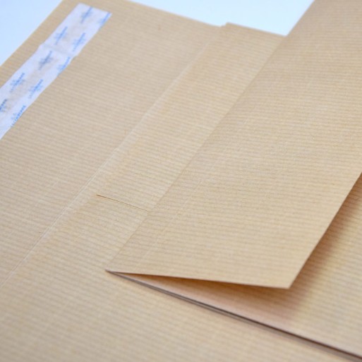 Bolsa 280x365 tira silicona kraft armado 130 gms fuelle 30 mm